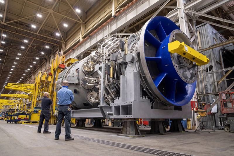 Technicians examine a 7HA.03 Gas turbine in Greenville